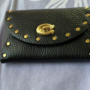 Coach wallet with gold Accents